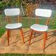 vintage wooden chairs with white faux leather