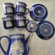 Vintage blue Taous dinnerware set of 21 pieces in very good overall condition.