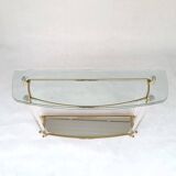 Hollywood Regency console table in lucite, glass and gold metal. 1980s