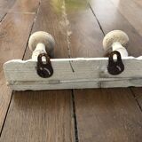Wall-mounted coat rack, bare wood