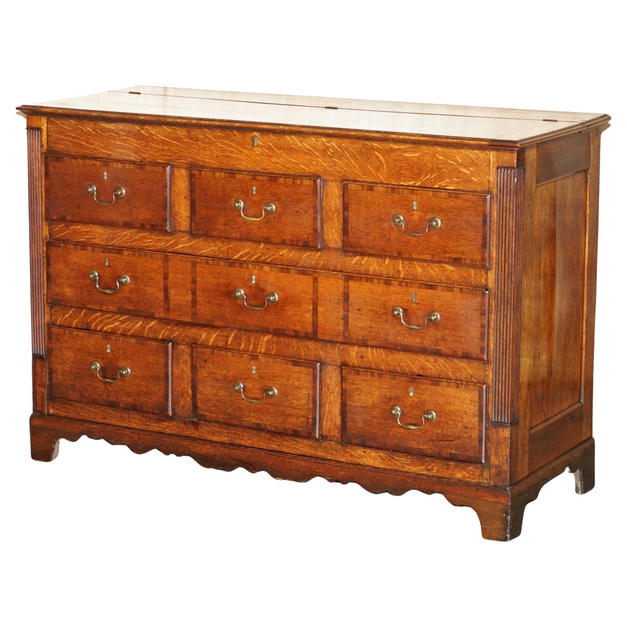 Georgian oak commode with a folding top, English, 18th century.