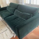 Dark green velvet sofa