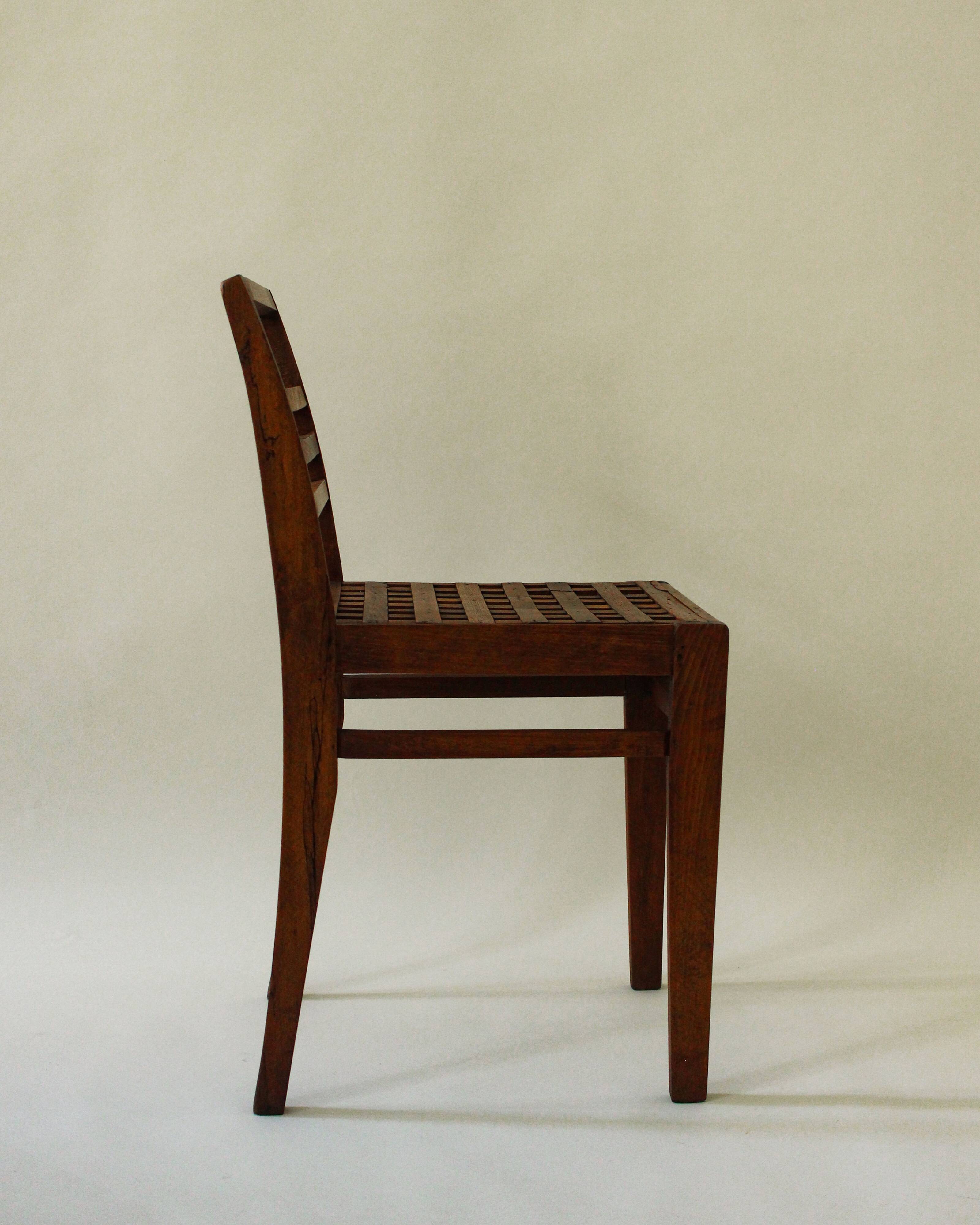 3 chairs model 103 with lattice seats by René Gabriel