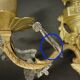 Pair of Louis XVI style tassel sconces, early 1900s - bronze & glass