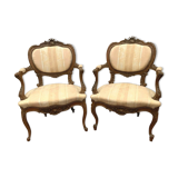 Paire de fauteuils rocaille en noyer XXe siècle
