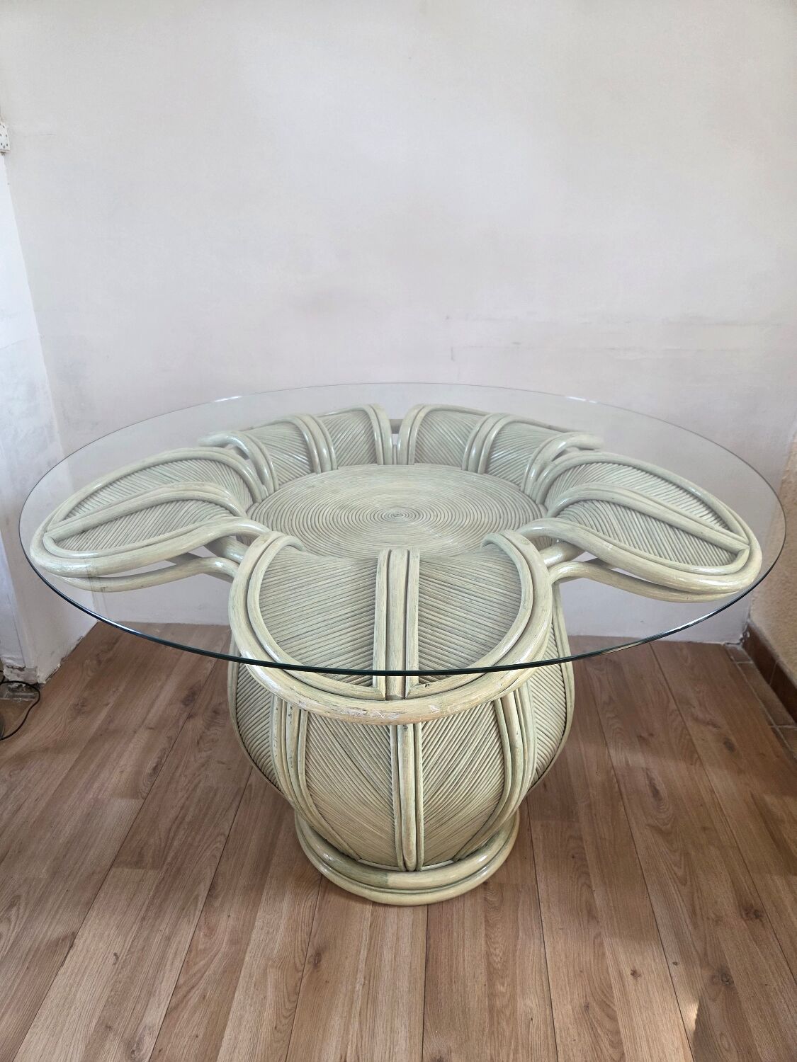 Dining table with a floral design in rattan, 1970.