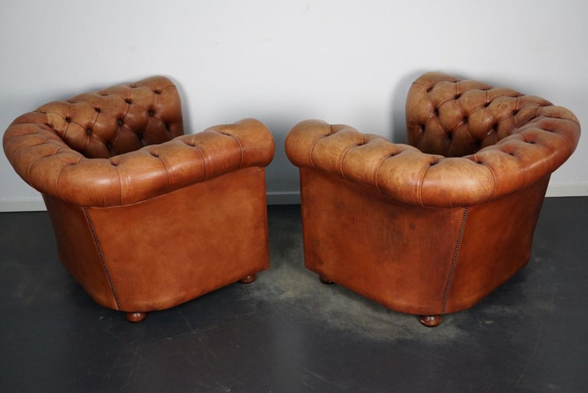 Set of 2 vintage chesterfield club armchairs in cognac leather, Netherlands,