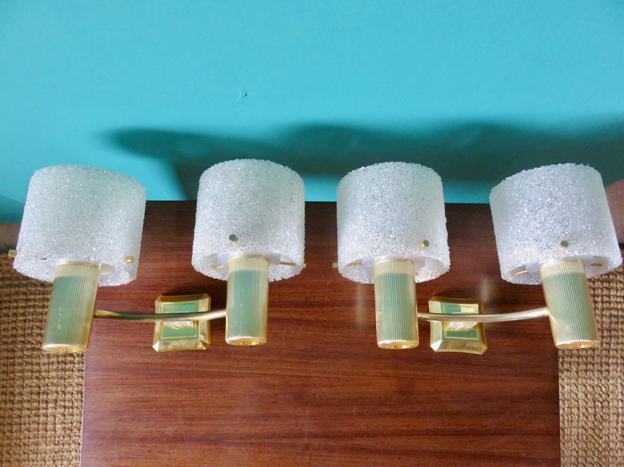 Pair of brass and gold plastic sconces with granite lampshades, France 1950