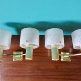 Pair of brass and gold plastic sconces with granite lampshades, France 1950