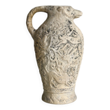 Poterie artisanale ancienne à tête de mouton