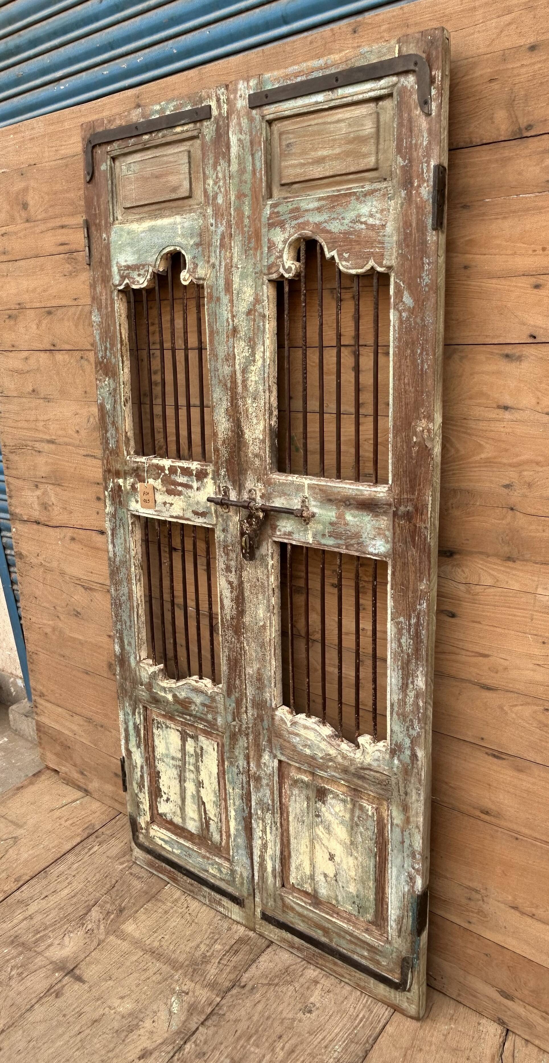 Art Deco patio door in Burmese teak with original patina.