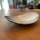 Elegant forged aluminium catchall.