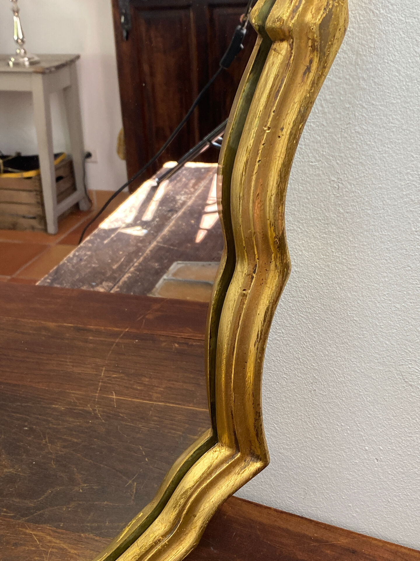 Large baroque mirror in gilded wood