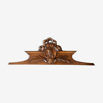 Old pediment in carved wood knot regency style