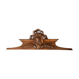 Old pediment in carved wood knot regency style