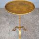 Minimalist brutalist gold metal pedestal table