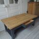 Coffee table on casters made from a vintage table, 1 drawer, 1 slate gray shelf.