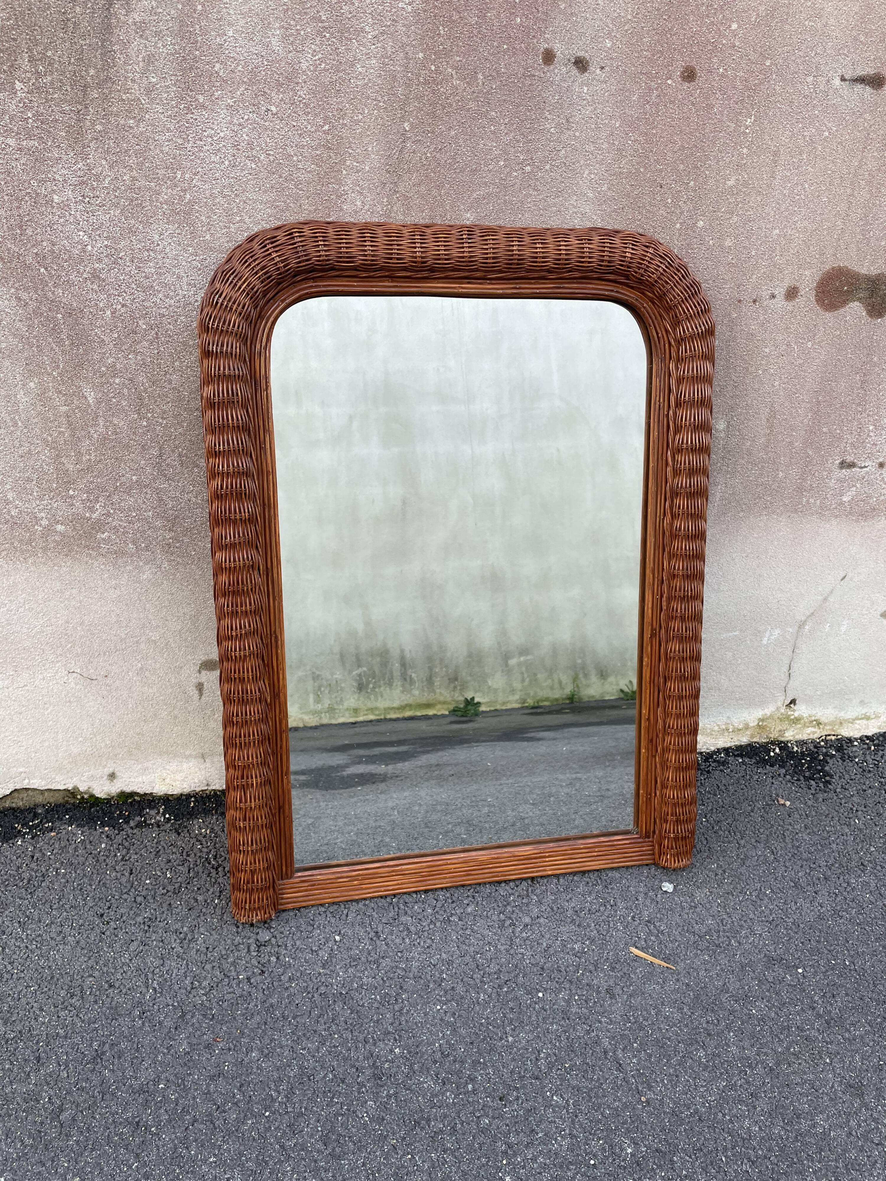Curved rattan mirror 70s