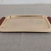Plates and a brass and Bakelite cut by PM Italy, Italy around 1970.