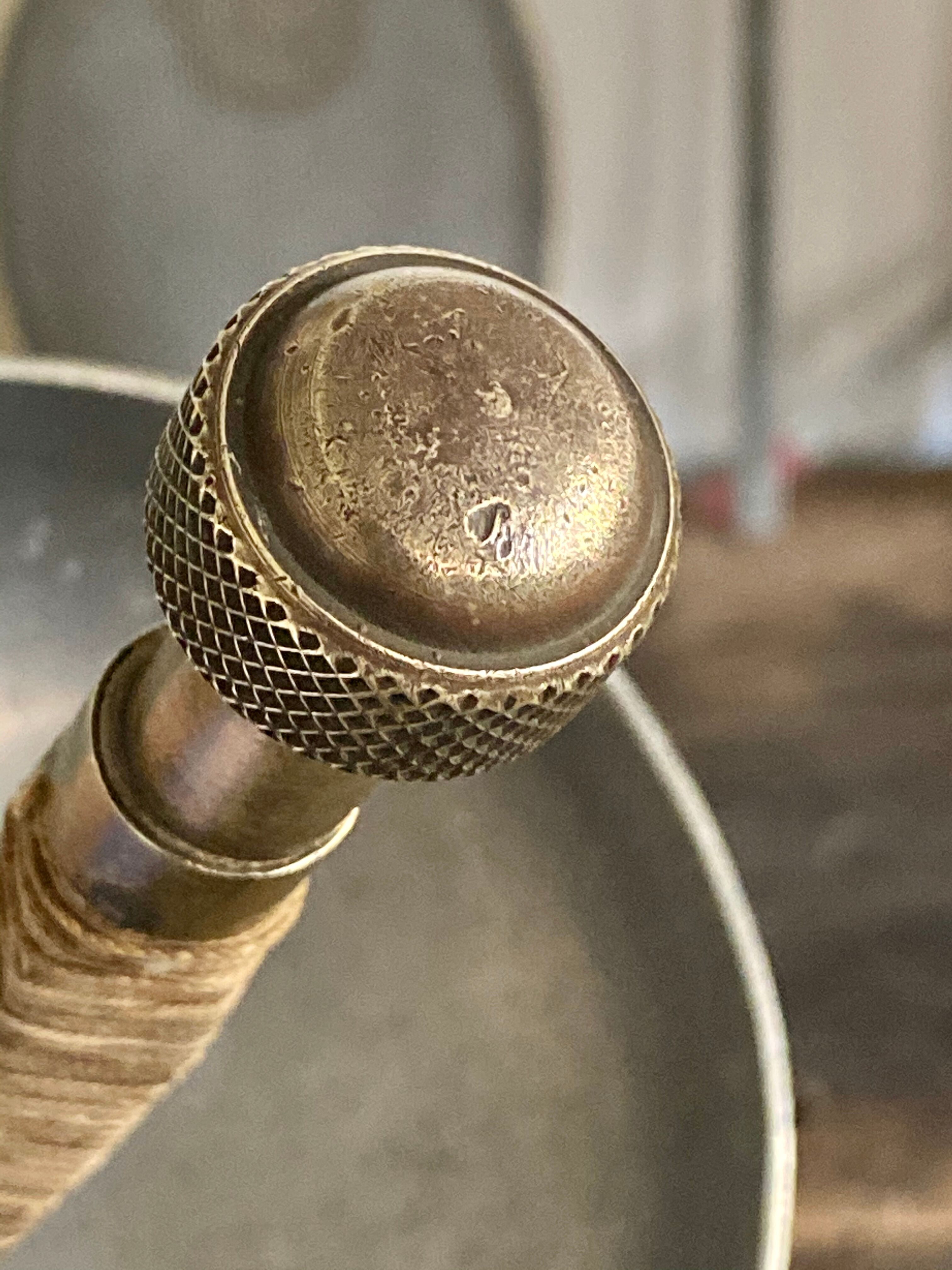 Old fencing mask set and its foil