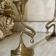 Art Nouveau style brass candlestick trio