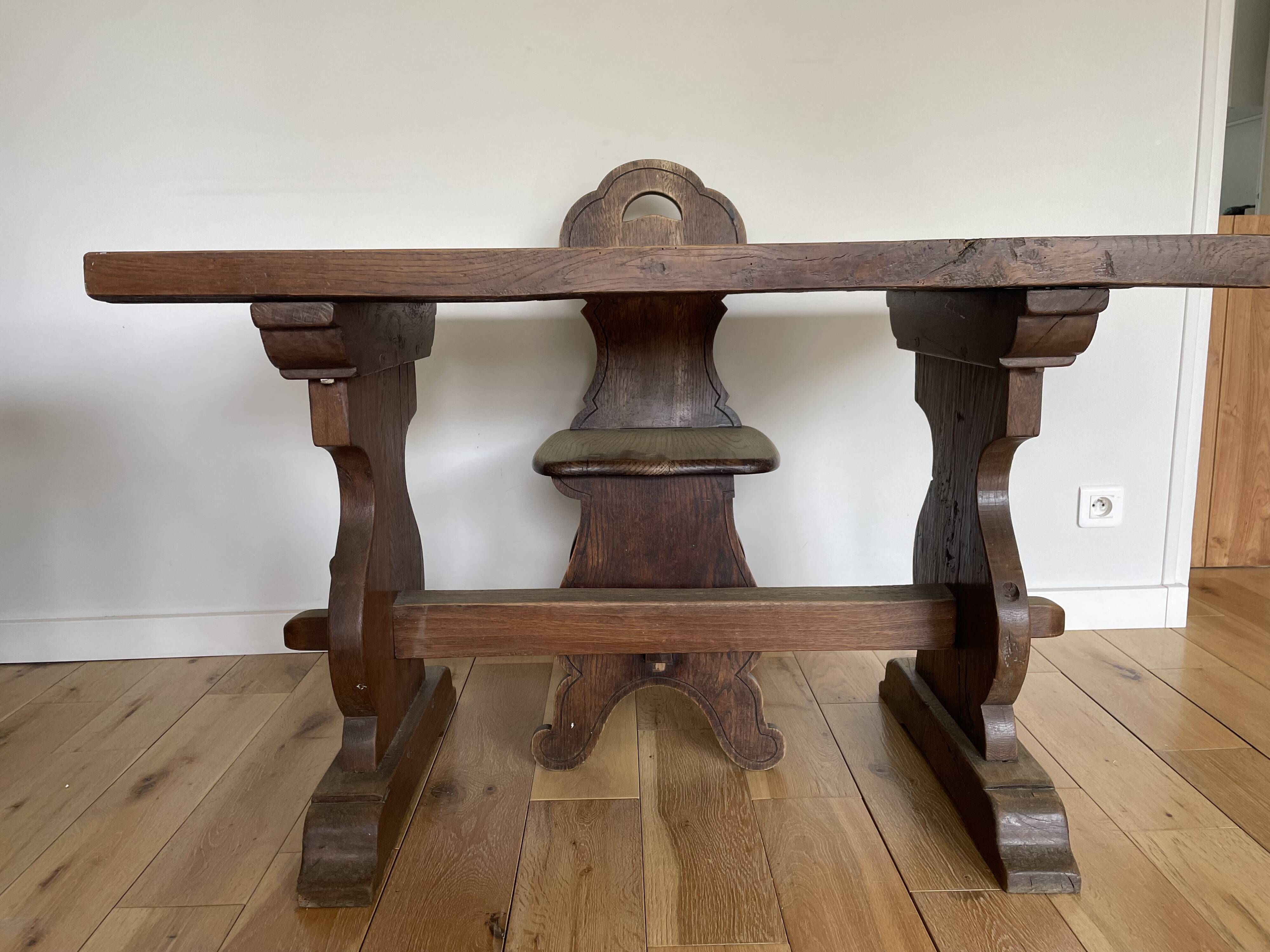 Rustic Spanish table and chair from the late 19th / early 20th century in solid oak.