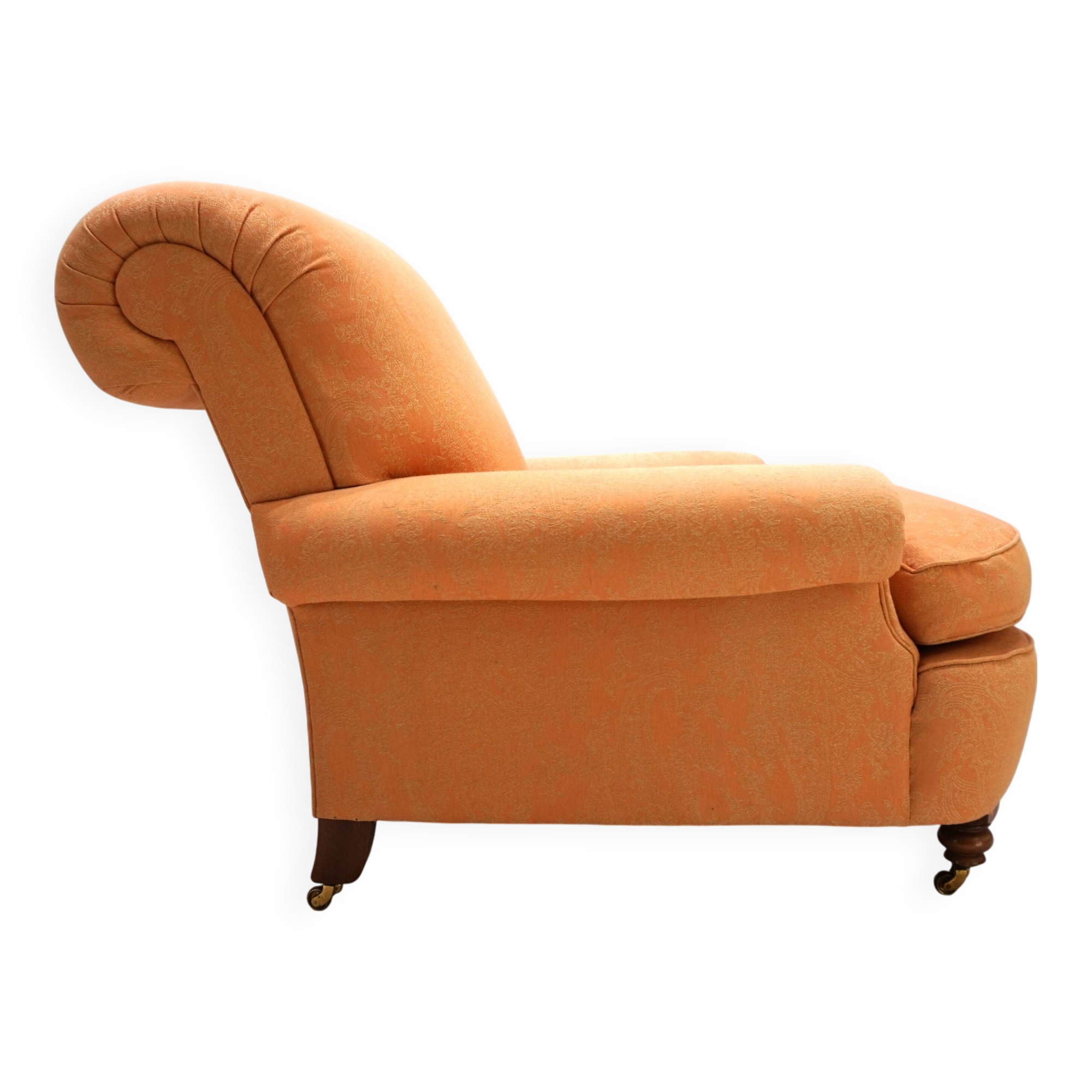 Deep seated armchair in the style of Howard & Sons