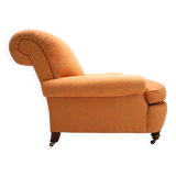 Deep seated armchair in the style of Howard & Sons