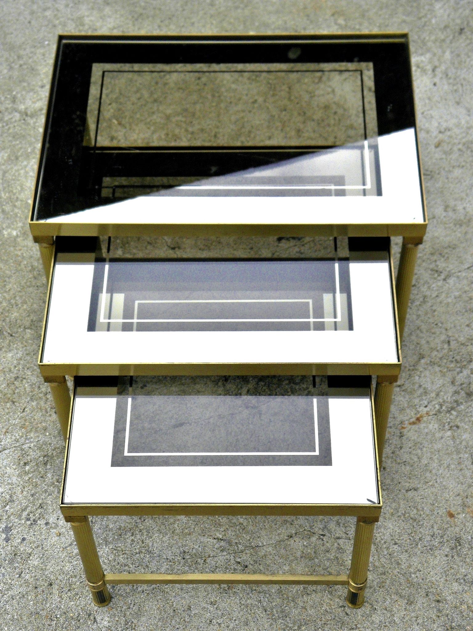 Brass, gold metal and 70s mirror glass tables
