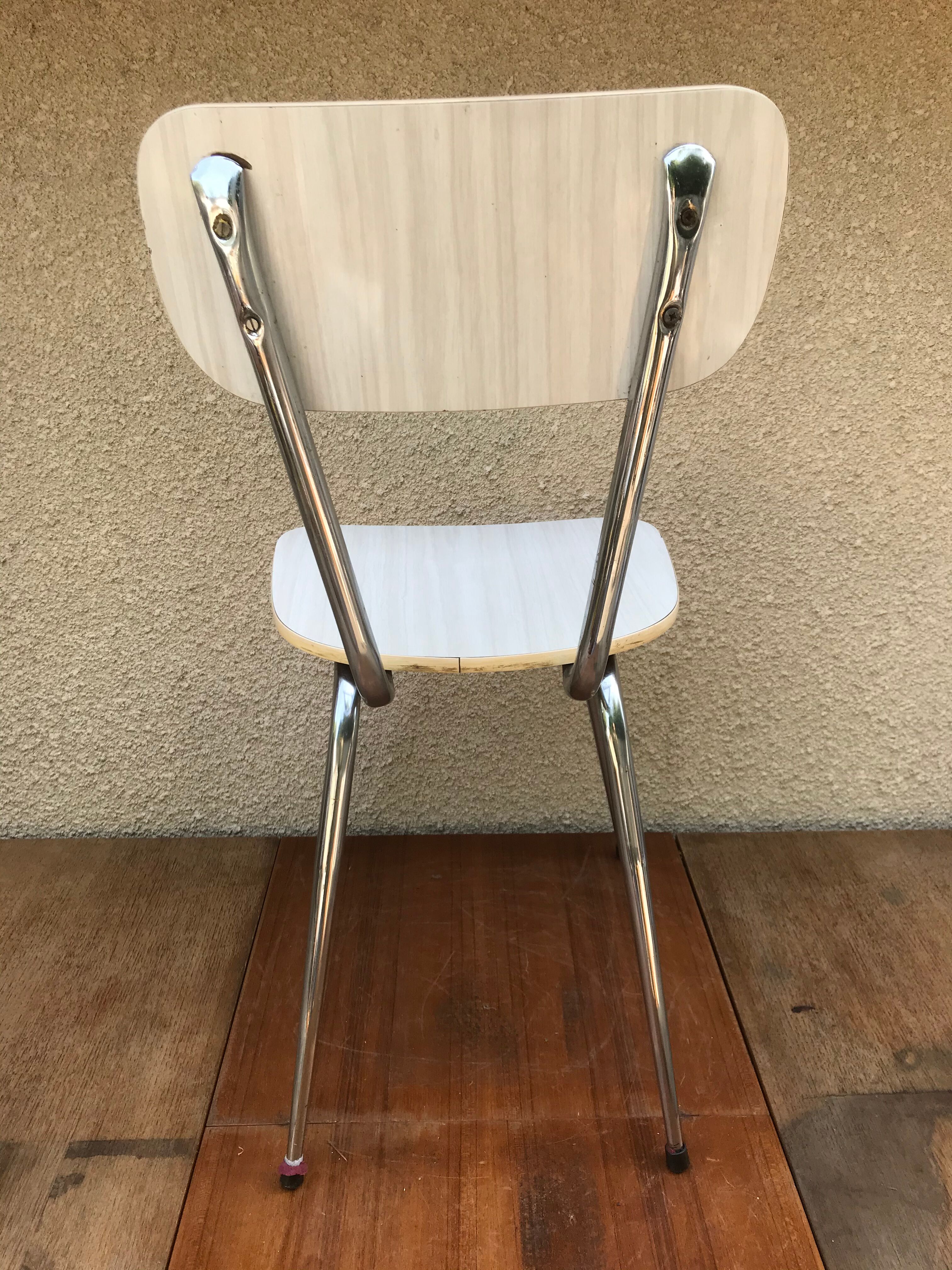 Former formica white kitchen chair