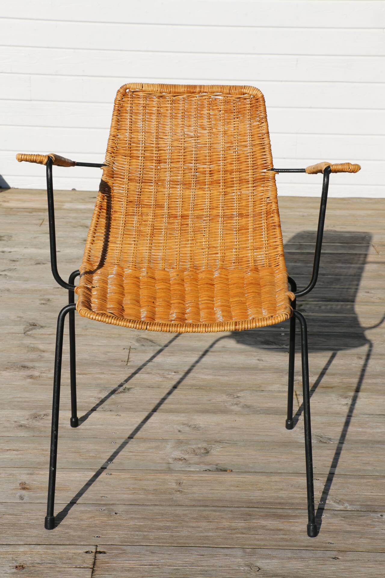 Rattan and steel armchair