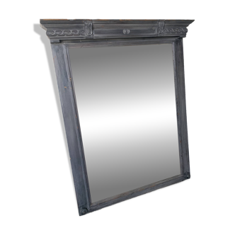 Wooden mirror with a patina of juice
