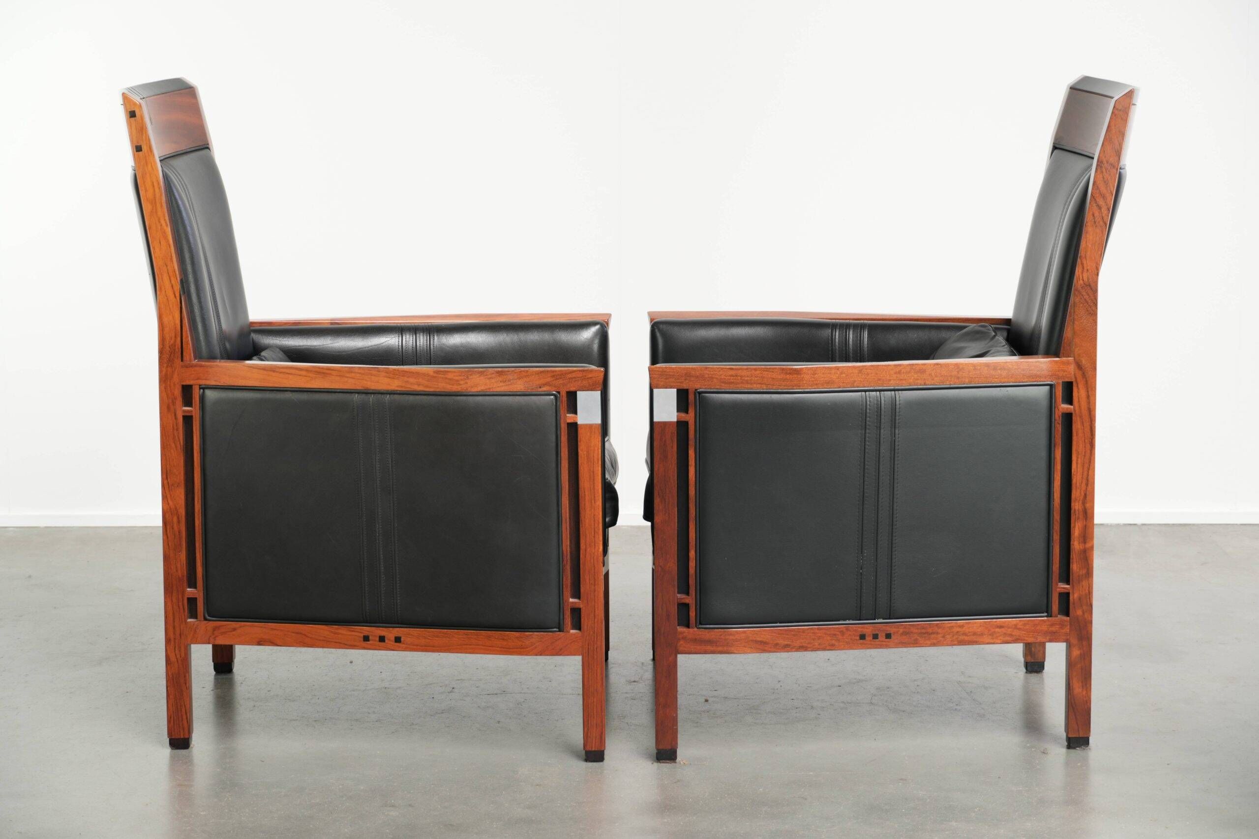 Set of 2 Art Deco design armchairs in black cowhide leather
