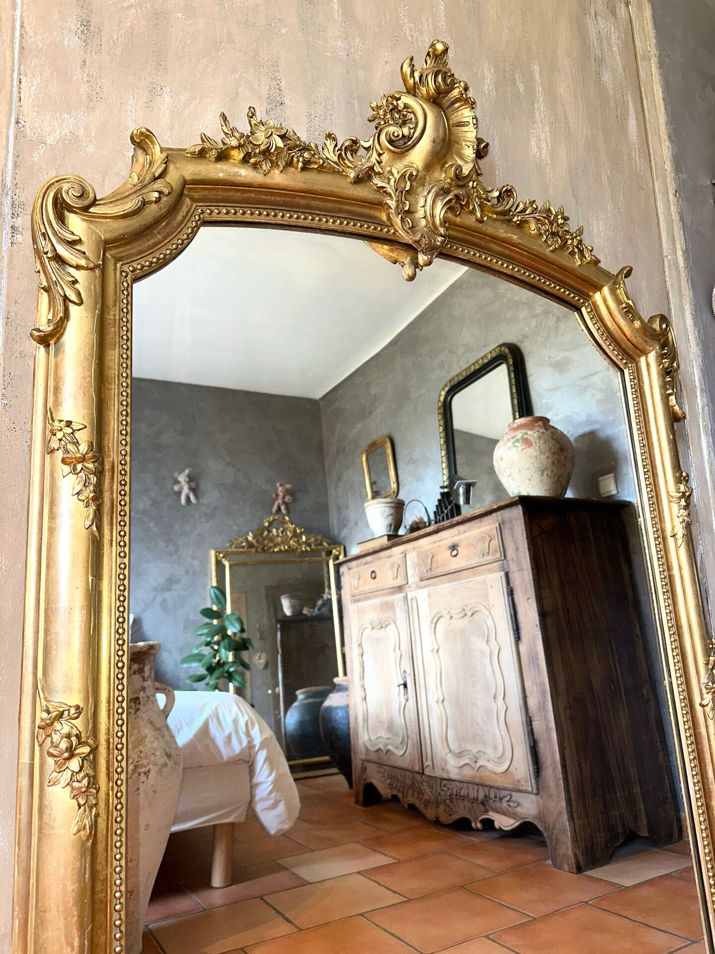 19th-century gilded antique pediment mirror