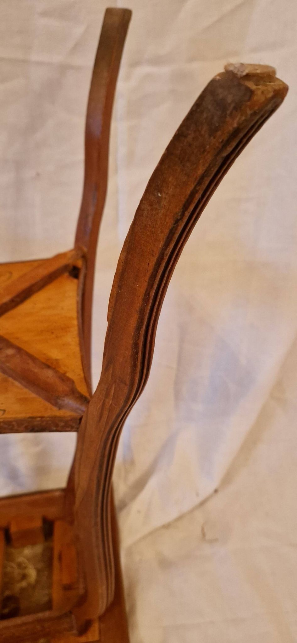 Antique Art Nouveau pedestal table with carved wood and marble top.