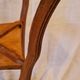 Antique Art Nouveau pedestal table with carved wood and marble top.