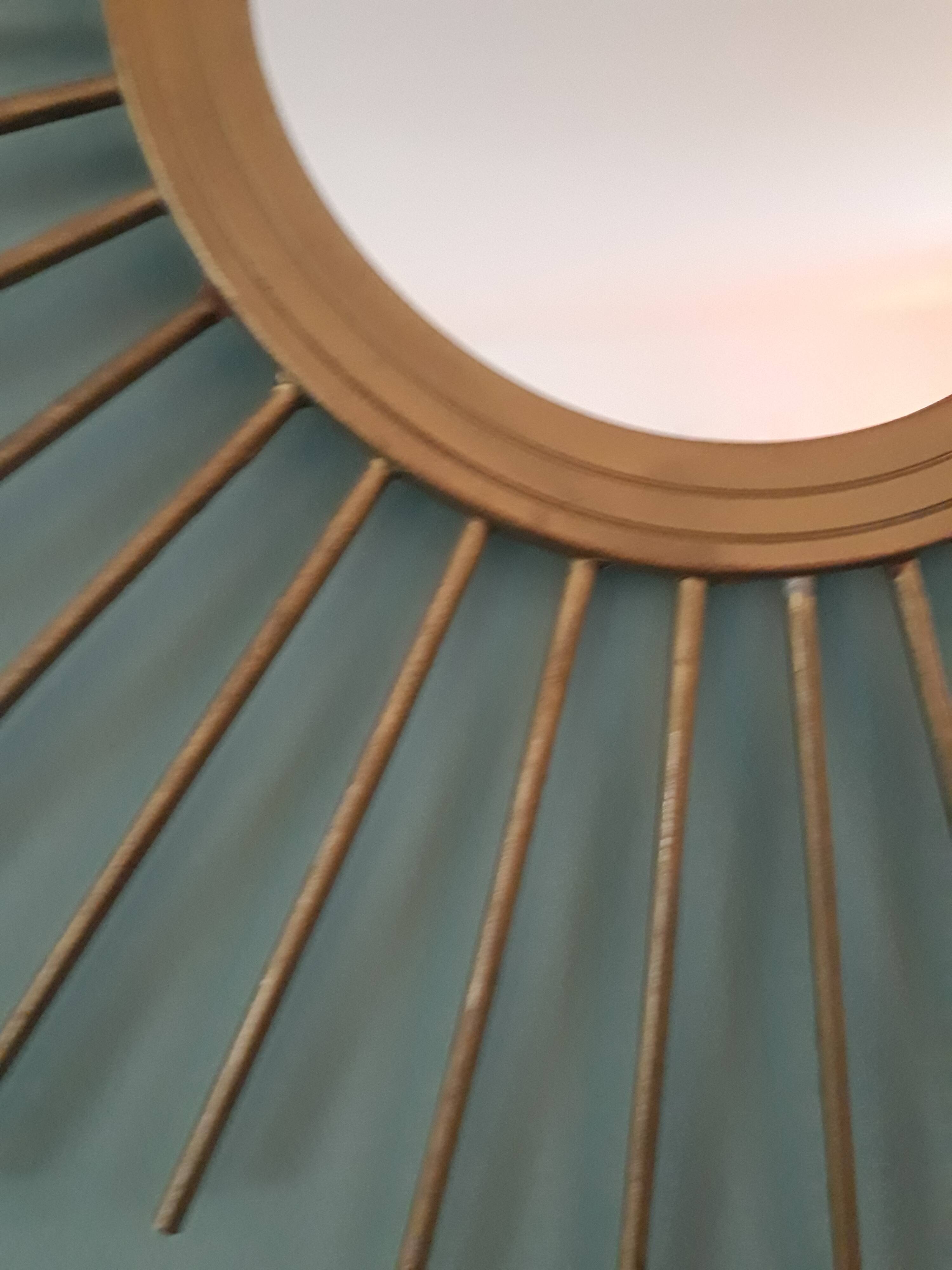 Vintage gold metal sun mirror