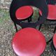 6 vintage Baumann seagull model chairs, black lacquered with red Skai seats.