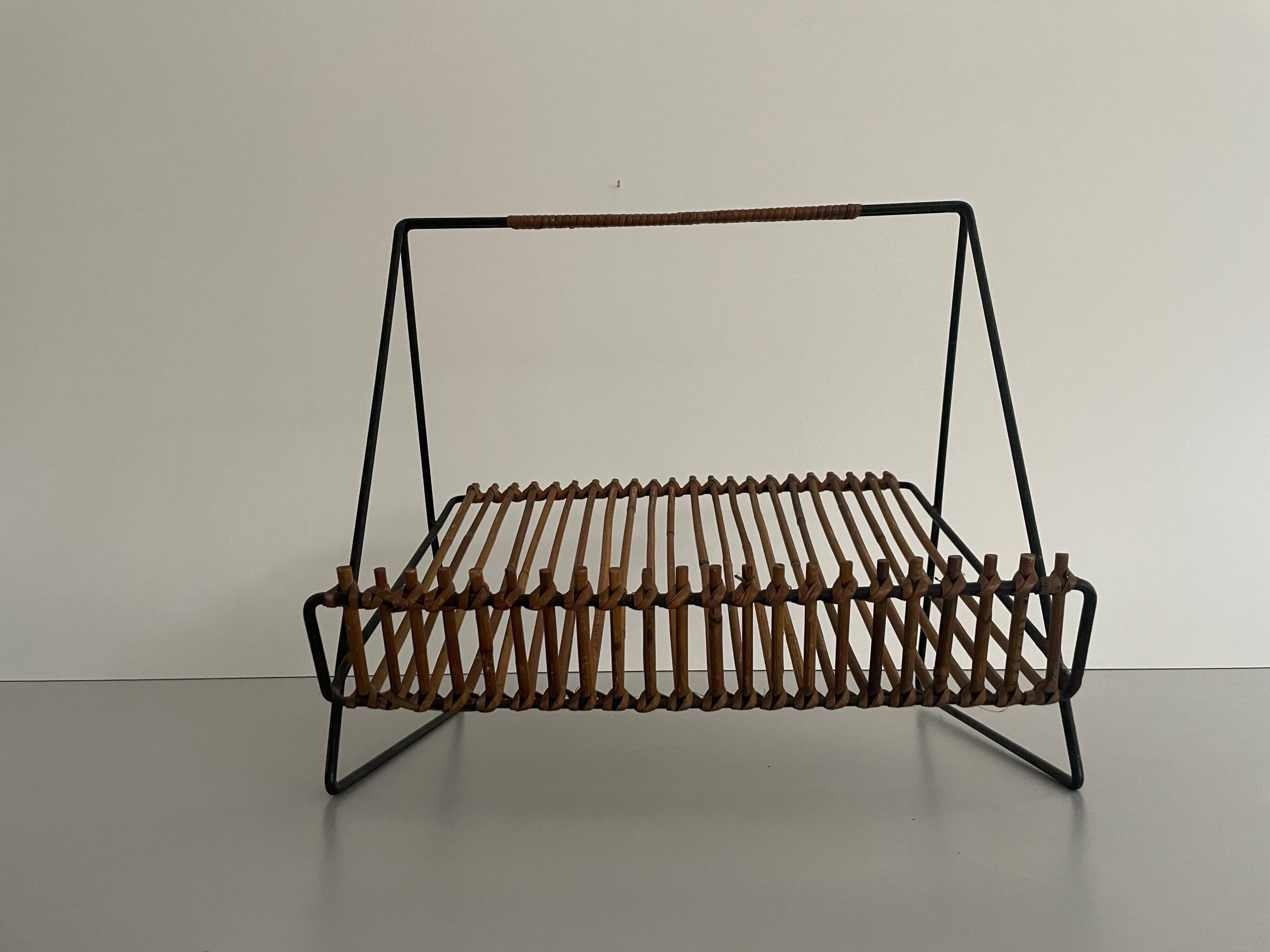 Mid-century black metal and rattan magazine rack, 1960, Italy