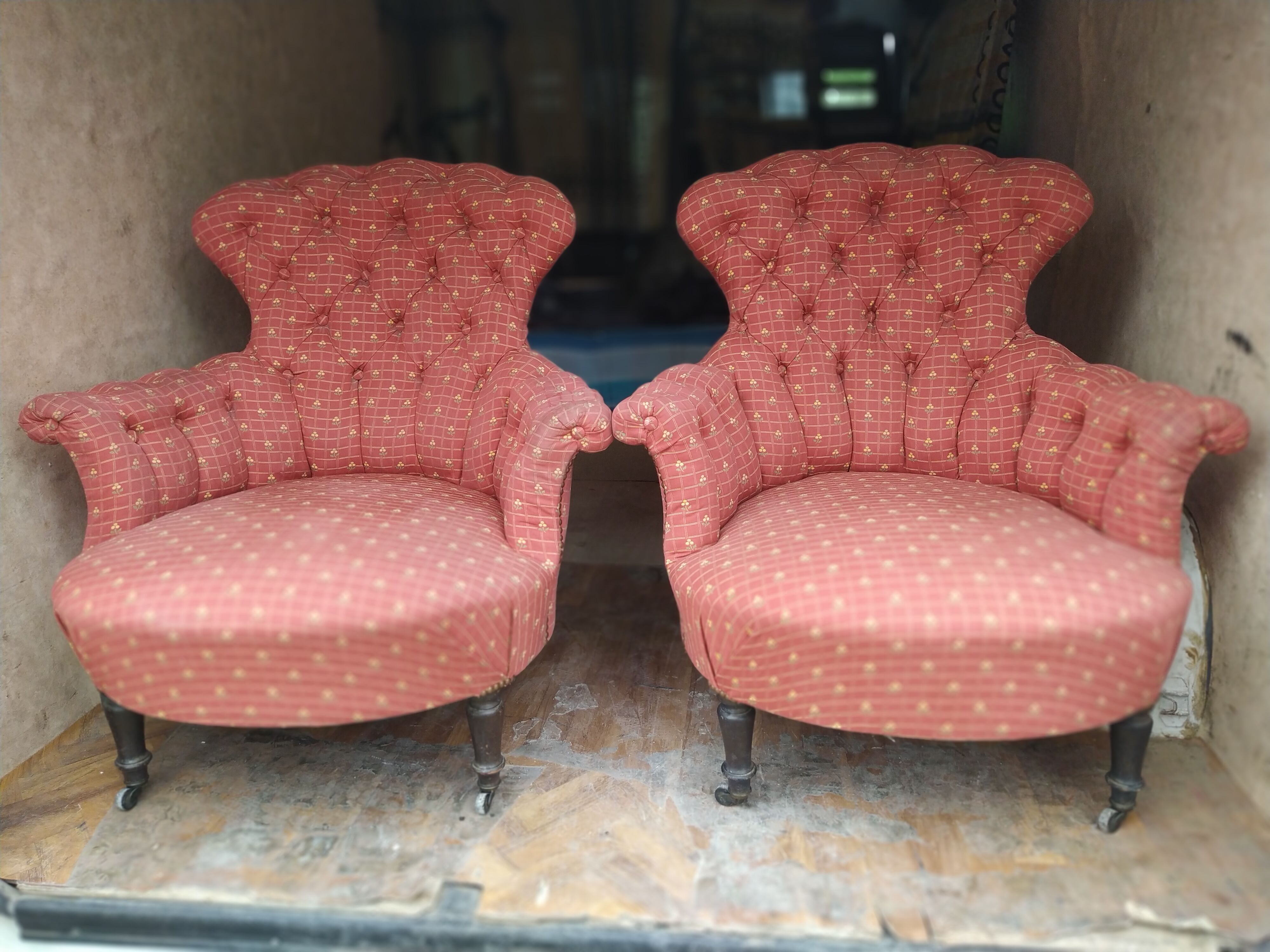 Pair of toad armchairs on wheels, upholstered.