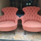 Paire de fauteuils crapaud sur roulettes capitonné