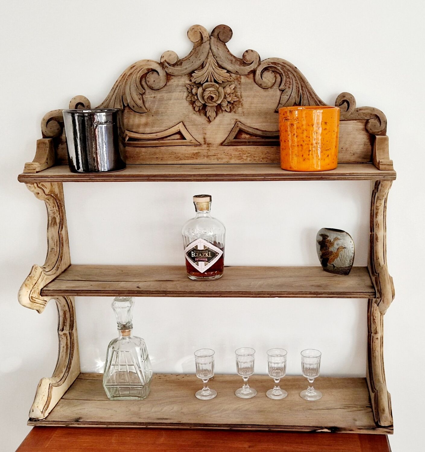 Old wall shelf carved in walnut