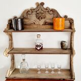Old wall shelf carved in walnut