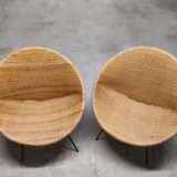 Pair of braided rattan armchairs