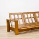 Solid elm sofa by Maison Regain from the 1970s.