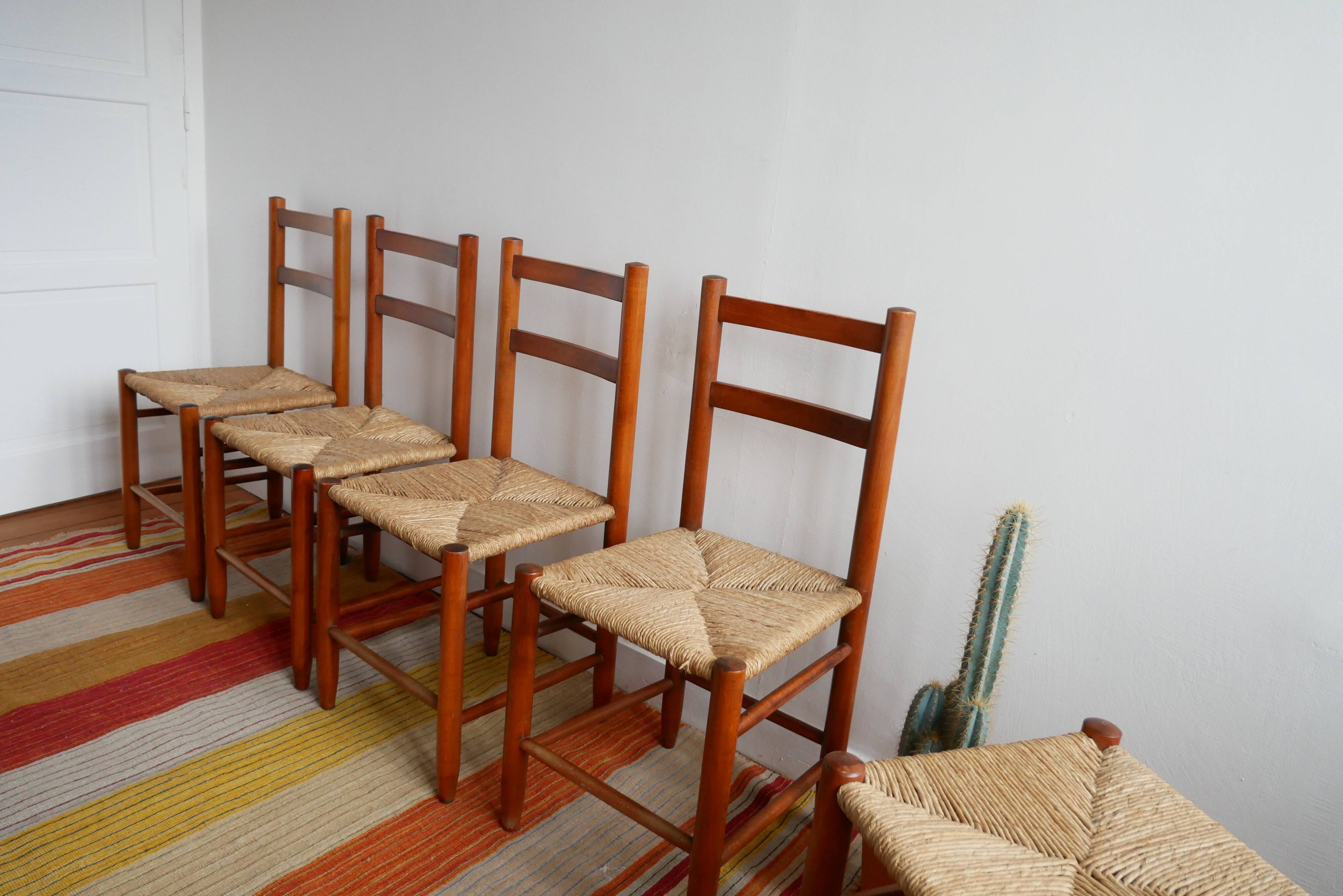 Set of 4 straw chairs and a stool