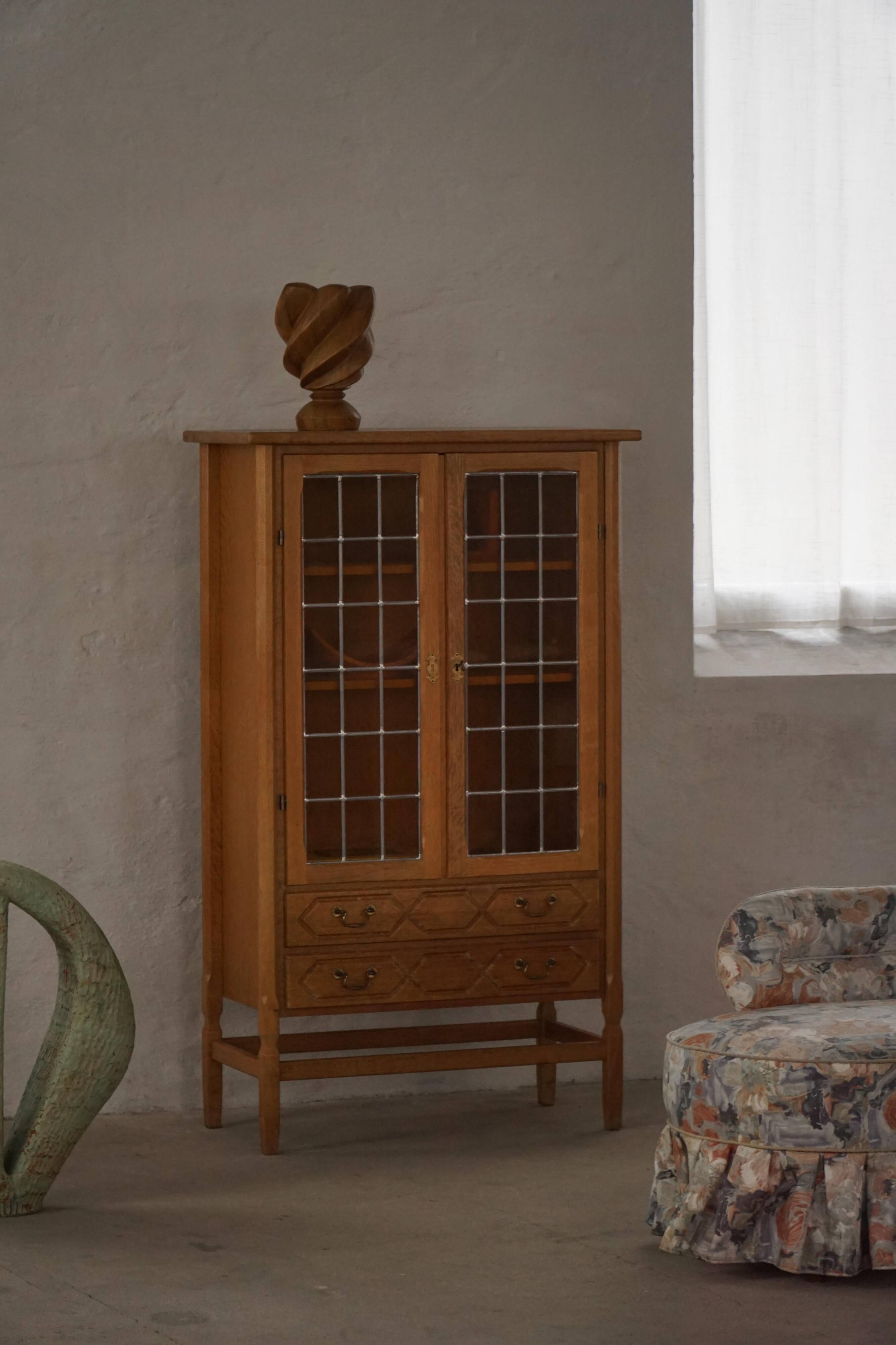Danish oak display cabinet from the mid-century modern period with leaded glass, 1960s.