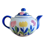 Antique teapot with flower pattern