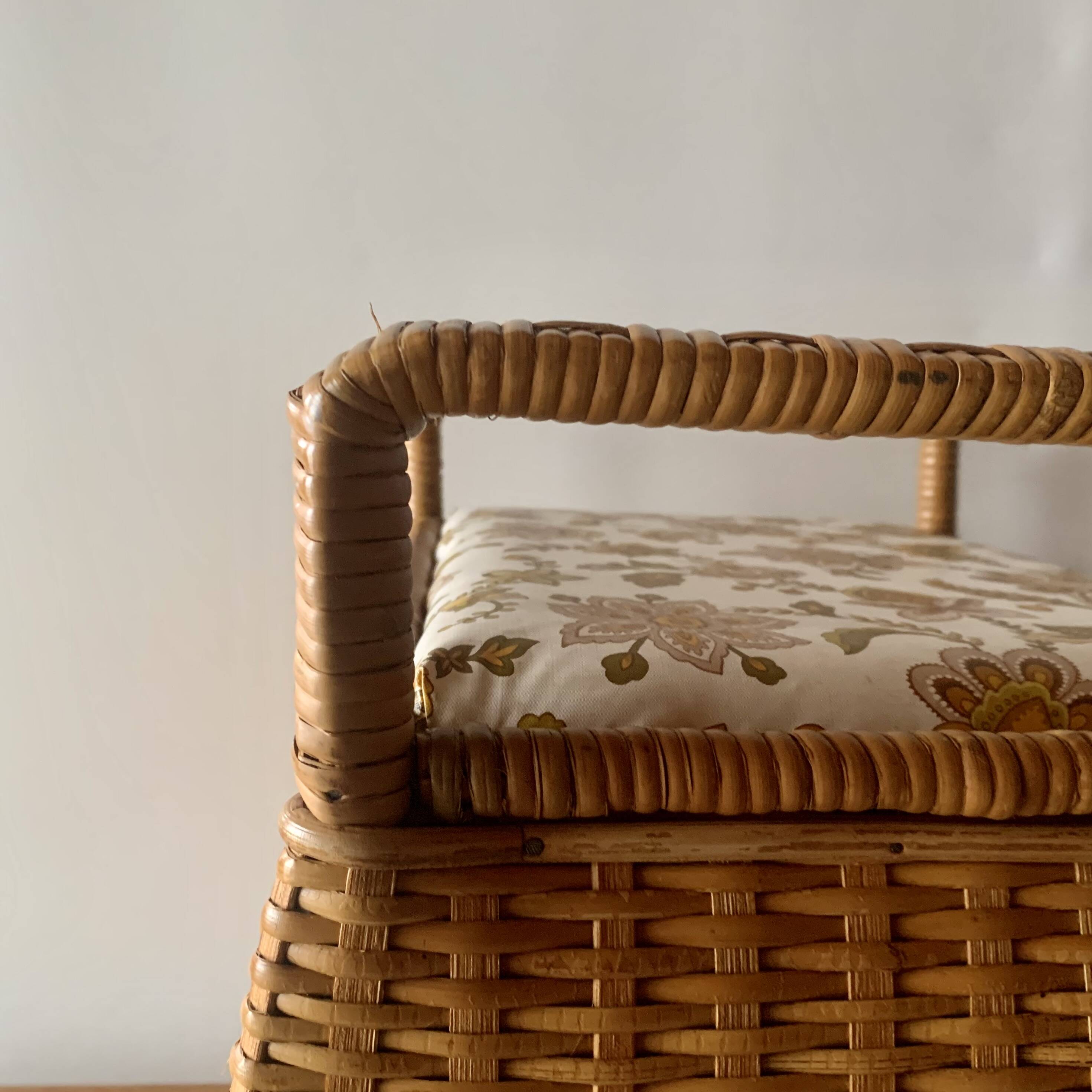 Large vintage rattan and wicker sewing basket with floral decor seat