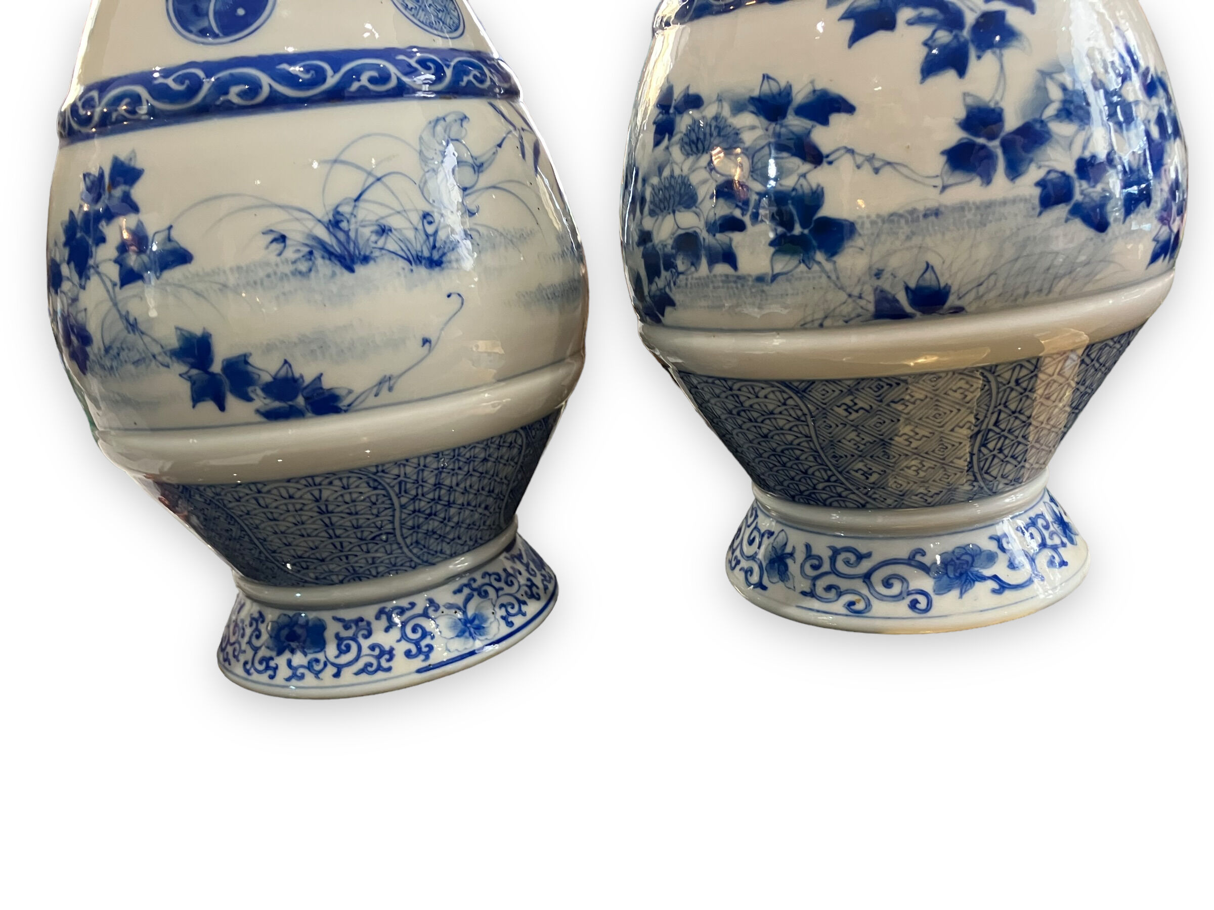 Pair of Asian vases in white and blue porcelain